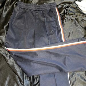 Medium navy blue with red and white stripe stretchy pants